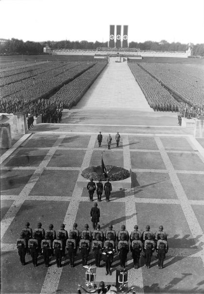 Party Day at Nuremberg, 1934. Beside Hitler stand Himmler (left) and Victor Lutze (right), the new SA commander.
