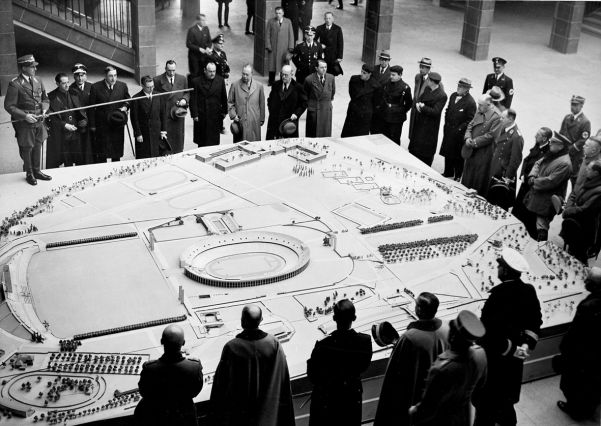 A model of the grand Berlin Olympic Stadium, plus the swimming pool, is shown to foreign and German guests.