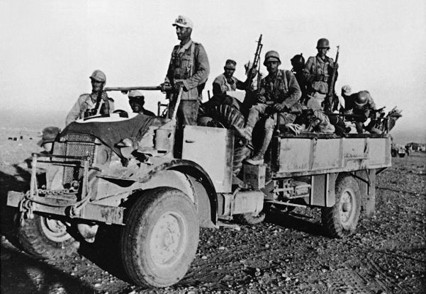 Desert fighters from Germany's Afrika Korps make use of a captured truck during Rommel's second offensive against the British Army