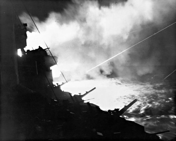 The US Navy bombards the island of Iwo Jima to soften up the defenses prior to an amphibious landing